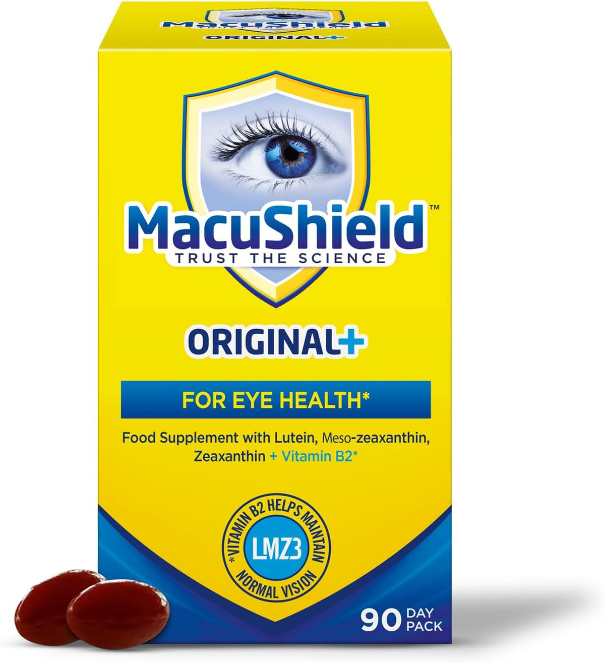 A box of MacuShield Original+ food supplement for eye health, shown on a white background with two dark red capsules in front. The packaging is predominantly bright yellow with blue and white graphics, featuring an eye illustration and text indicating a 90-day pack.