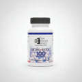 A bottle of Ortho-Ncicular Products Ortho-Biotic 100 Billion Cols supplement resting on a laptop keyboard in a home office setting.